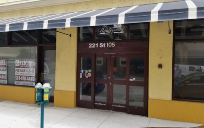Closed shop with striped awning