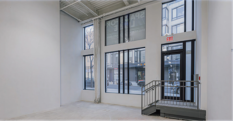 Empty room with large windows