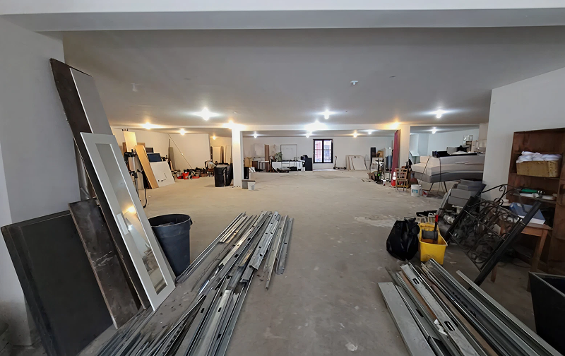 Construction materials in large, unfinished room