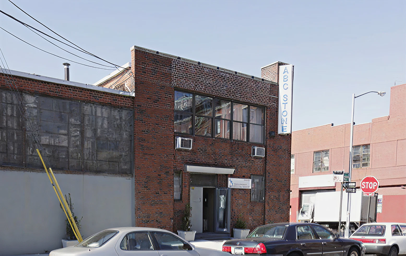 Industrial area with a brick facade.