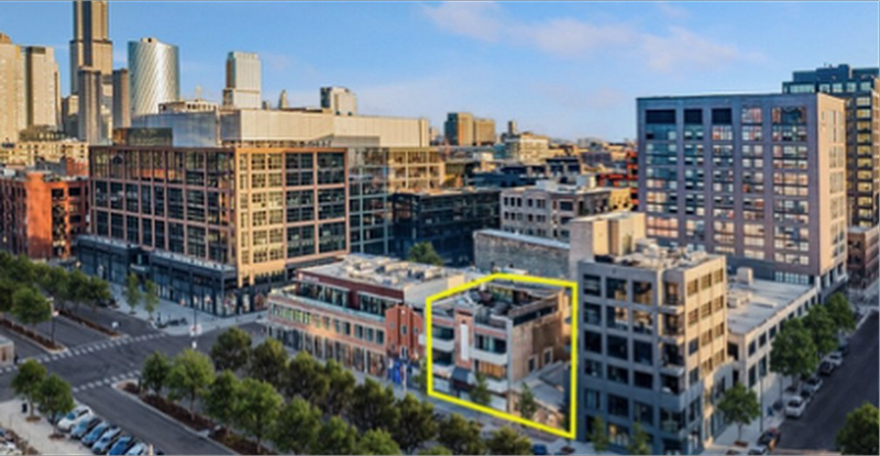 Cityscape featuring a marked structure