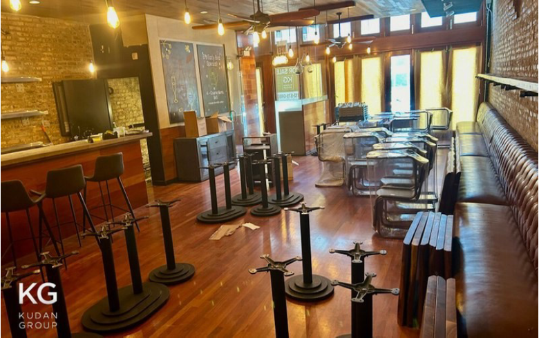 Bar area with stools and wooden floor