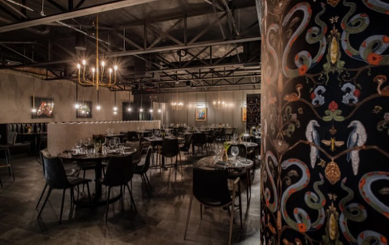 Moody dining room with ornate wall design