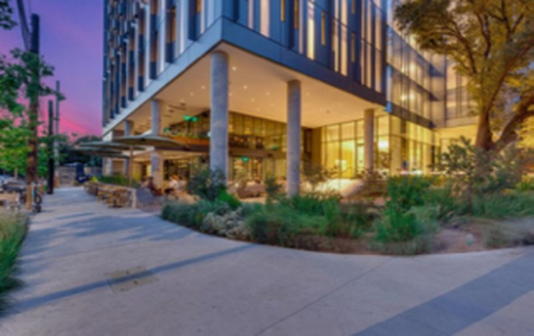 Modern building exterior at sunset