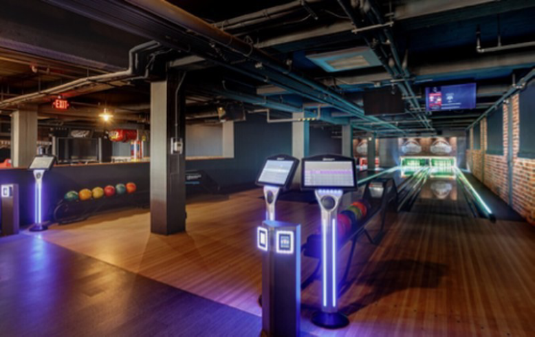 Modern bowling alley with glowing lights