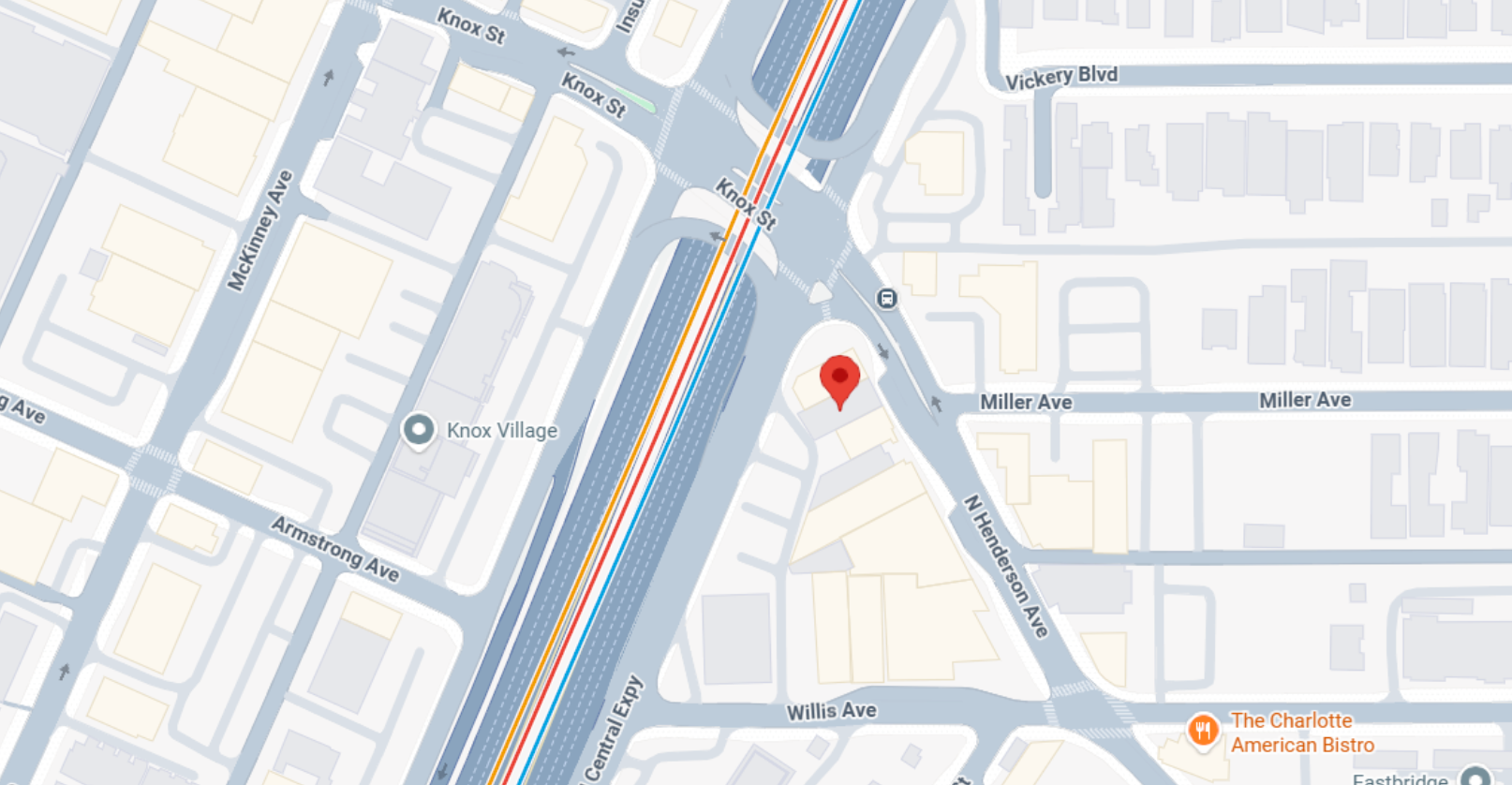Map with red location pin near train tracks